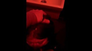 Hot college slut gives a hard blowjob in the toilet of a nightclub