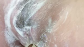 Rubbing my swollen pussy in the shower