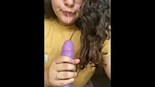 Latina In Glasses Sucks Big Purple Dildo