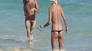 Hot German couple has fun on the beach. Reality.