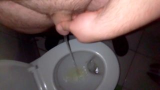 Pissing man 