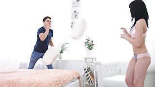 Pillow fight between lovers leads to passionate lovemaking