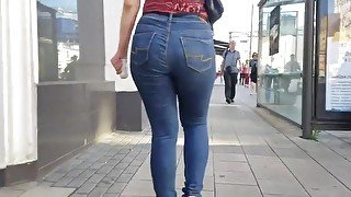 Brunette MILF with hot massive ass in jeans