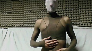 YOUNG GUY IN TAN PANTYHOSE ENCASEMENT MASTURBATING