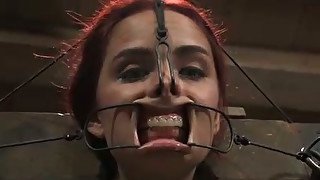 Hot redhead chick with pins on her tongue got her mouth stretched