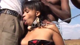 Hot ebony doll caught between two black cocks