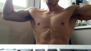 Flexing my hard muscles and cock for a straight guy to see, and he likes it