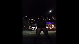 Milf masturbates and cums busy downtown city corner after pissing,risky