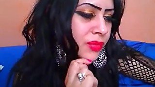 Arab girl in fishnet shows her big tits and ass