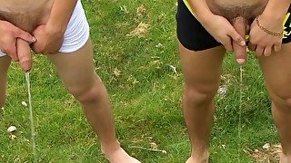 Young British amateurs suck their hard cocks while outdoors