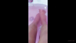 Footsie in the tub imagining my feet massaging your dick