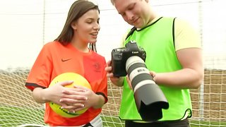 A sexy soccer girl fucks her coach on the field after practice