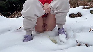 Girl pissing in the snow, pee in public