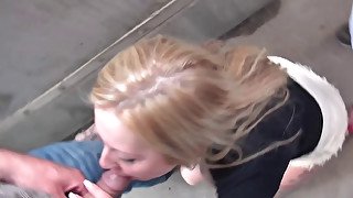 Busty bitch sucking and riding a couple of dicks publicly