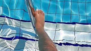 Hot feet play in pool