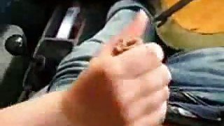 Horny redhead girlfriend gives me handjob in my car