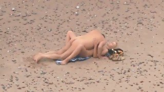 Mature grey haired chubby dude was fucking his blonde wife on the beach