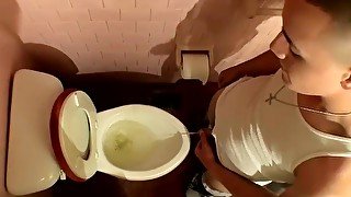 Naughty twink Jake Reid gets caught pissing in the toilet