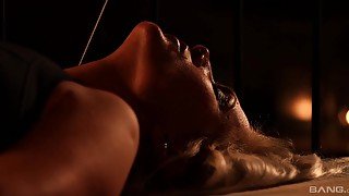 sensual Kathy Anderson masturbates in the dark room by her fingers