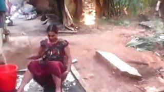 catches village aunty bathing nude outside -