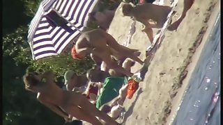 Sexy people on the beach having fun voyeur video