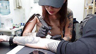 Risky! Fucked in the tattoo studio of a sexy tattoo artist!