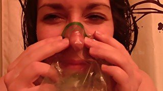 Nose Blowing Into Plastic See Through Bag