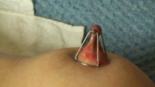 Nipple clamps and glowing wax