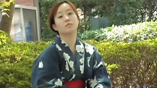 Sharking video shows a Japanese chick in a kimono in a park