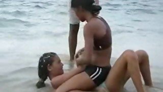 Dominican girls sexy wrestling on beach body to body