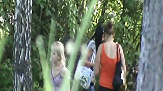 Lovely stranger white chicks in the forest piss under the bushes