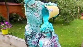 Exquisite babes throwing some blue paint all over their curves