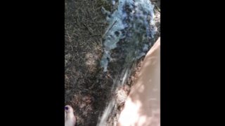 Outdoor pee desperation female POV, piss puddle