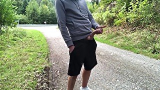 Guy jerks off near the road and cums hard