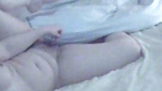 Tempting homemade video of my chubby wife masturbating in bed