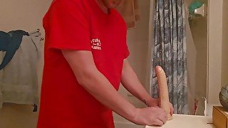 Deepthroating big dildo