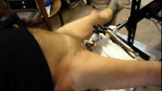 Fuck machine sounding my cock in chastity cage