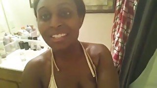 Sexy ebony girl showing big butt in the bathroom