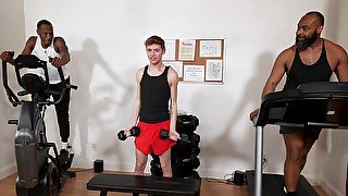 Skinny white dude gets fucked hard by two black dudes in the gym