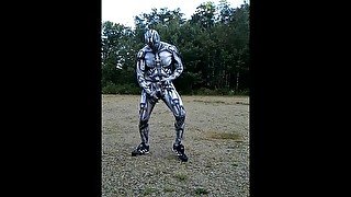 Spandex android jerking off inside spandex outdoors