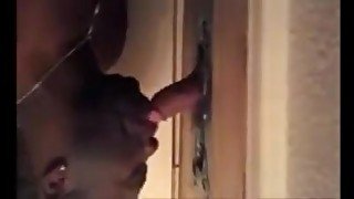 Black guy sucking off big white cock at gloryhole