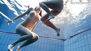 Naked girls swimming erotically underwater