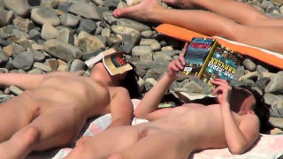 Nudist girls expose bodies at the beach