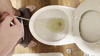 Master Justin Pisses in Toilet