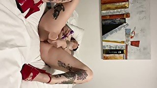 Tattooed milf stretches pussy with gigantic dildos