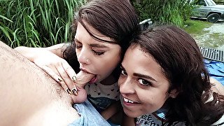 Gina Valentina and Vienna Black give blowjob outdoors