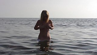 Divine Blonde teen 18+ Blissfully Naked in the Sea