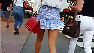 candid gorgeous model in blue ruffle skirt