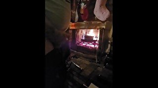 Jerking off next to a warm fire