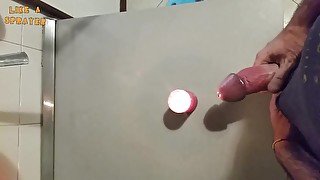 Homemade handjob with cumshot on a candle, big cock and big load, jerking off on the flame